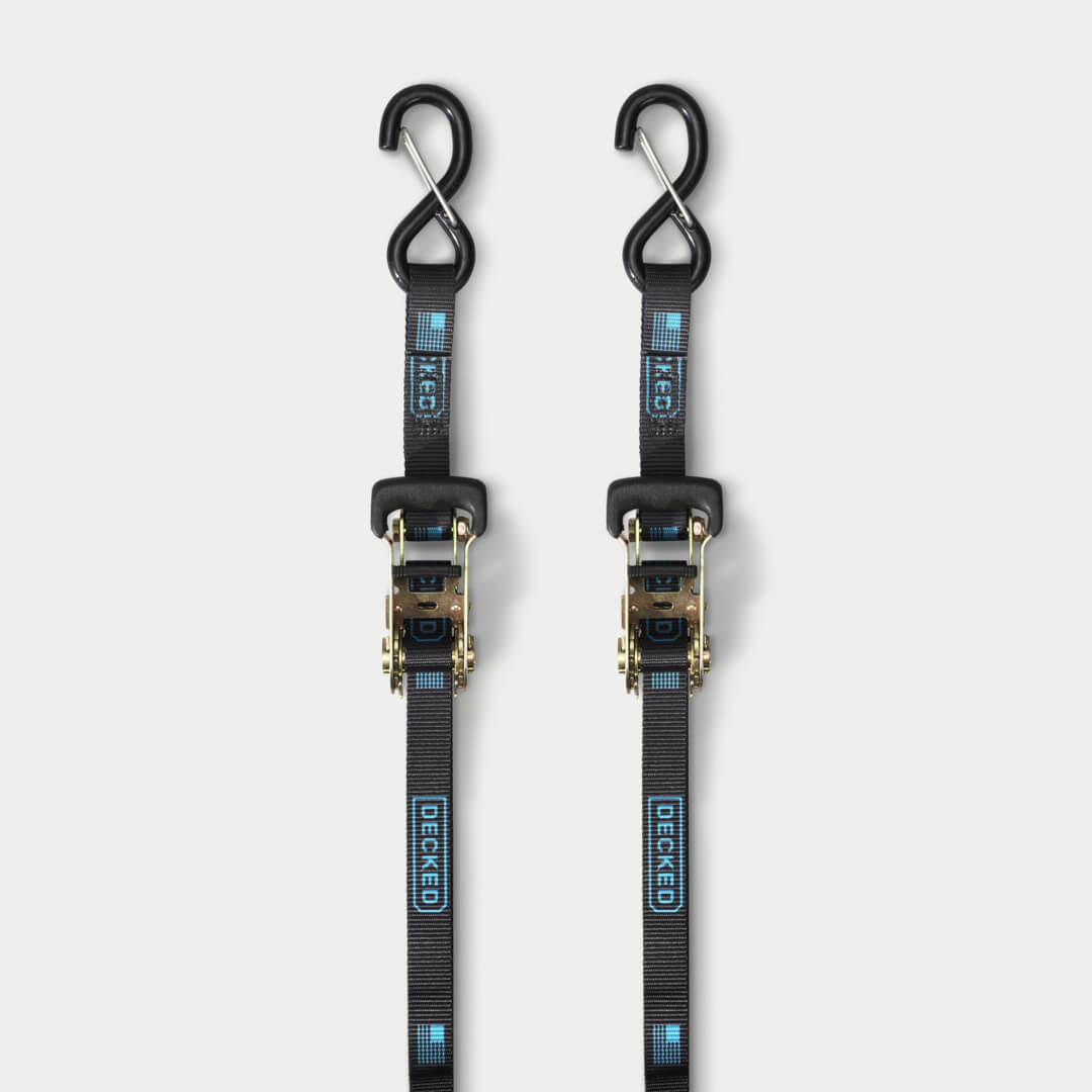 Black ratchet strap on grey background