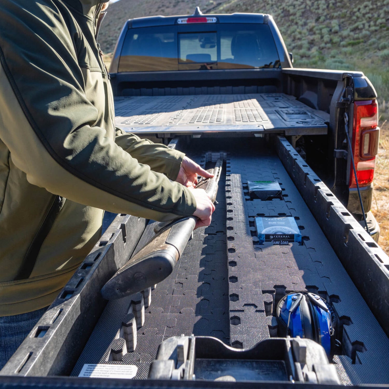 A man removing his shotgun from his Drawer System Piecekeeper PuzzleFoam.