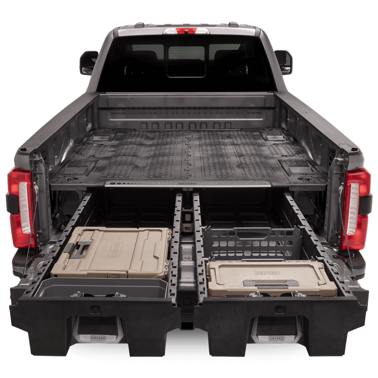 An open DECKED Drawer System with accessory options in the bed of a Ford F-350.