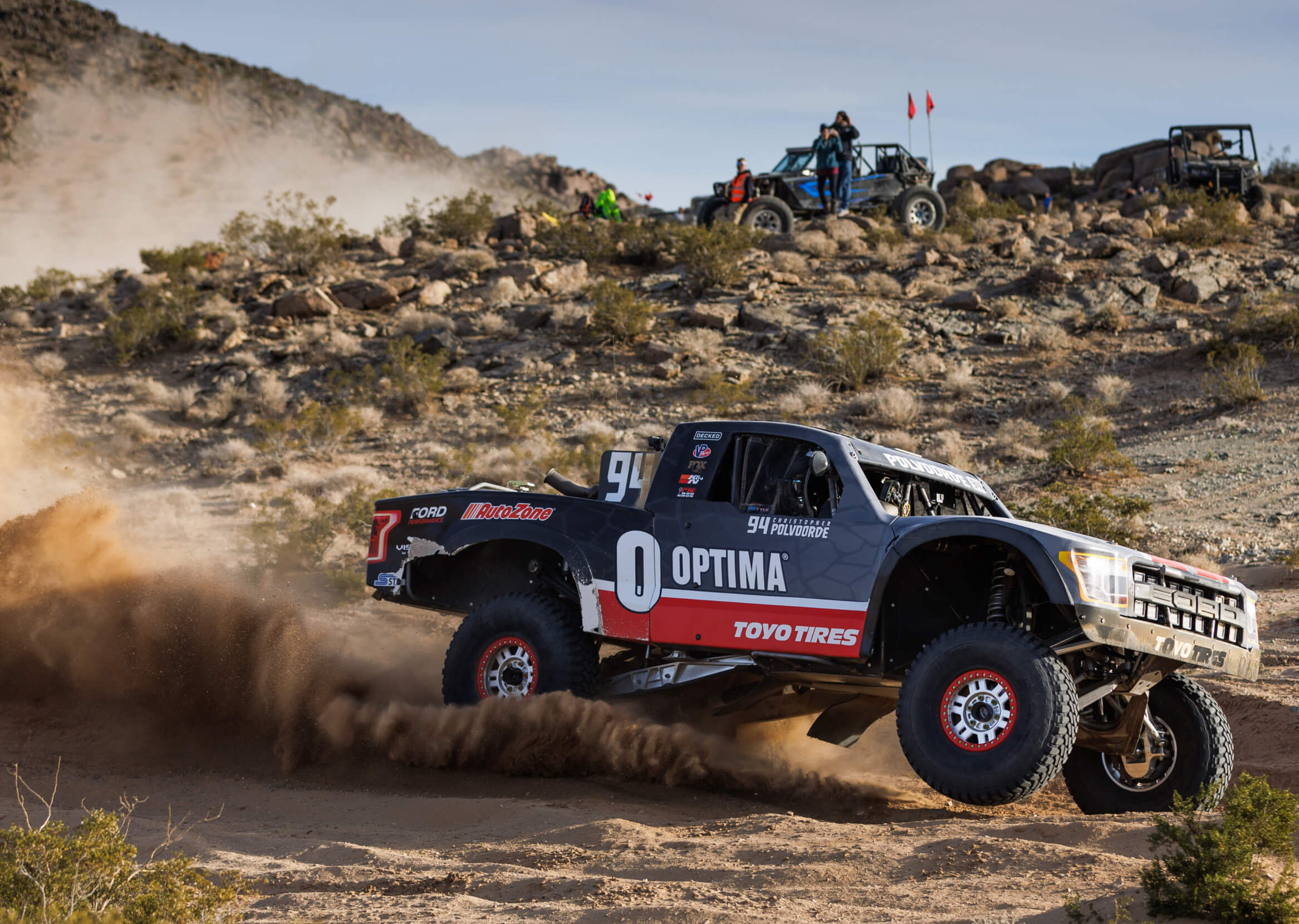 Chris offroad racing in the desert. 