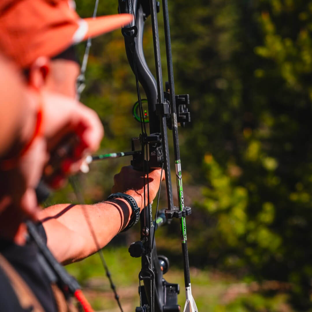 Danny Bolton at full-draw, his bow is the only thing in focus so his target remains a mystery.