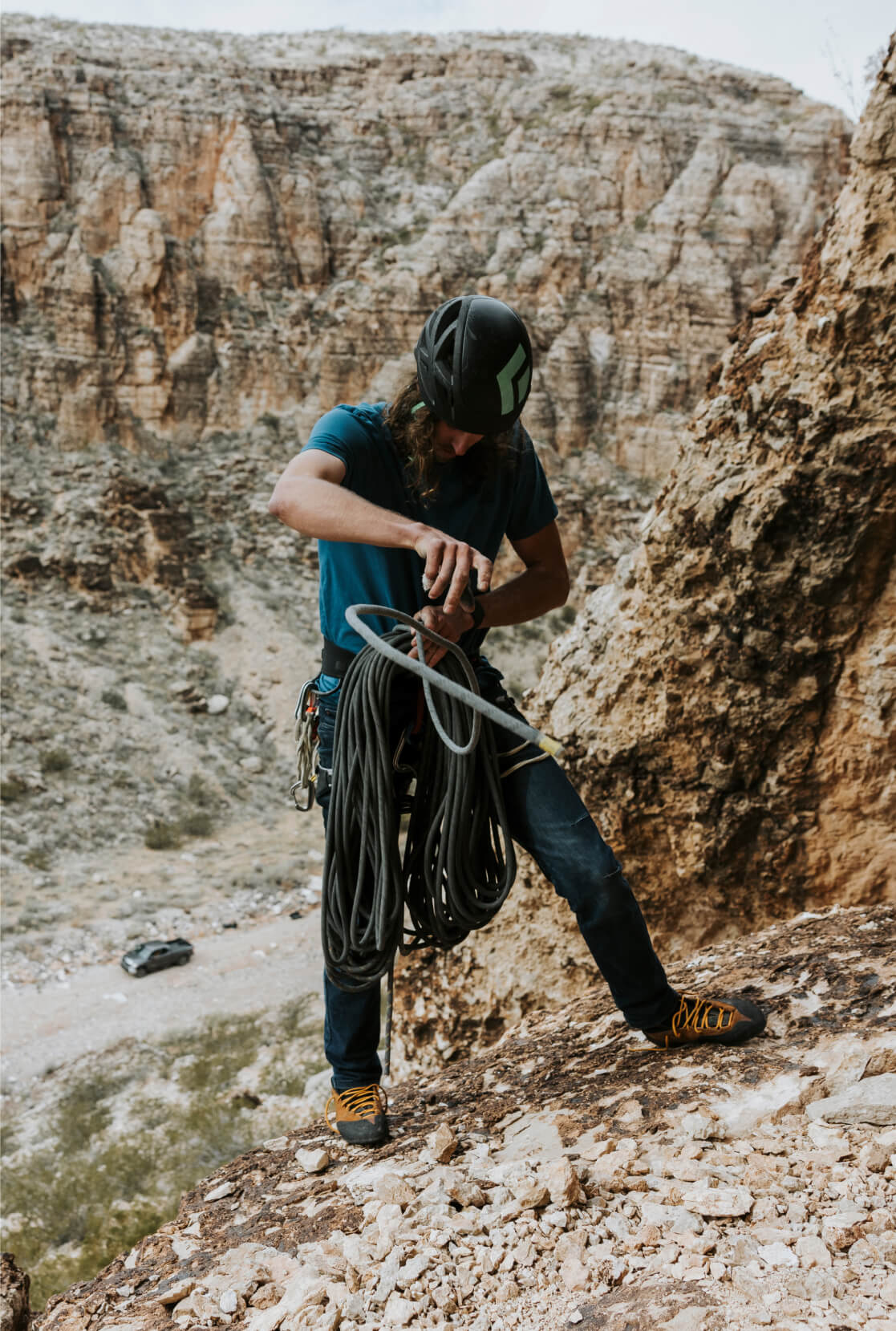 Jackson Marvell untangling ropes at the base of his climb.