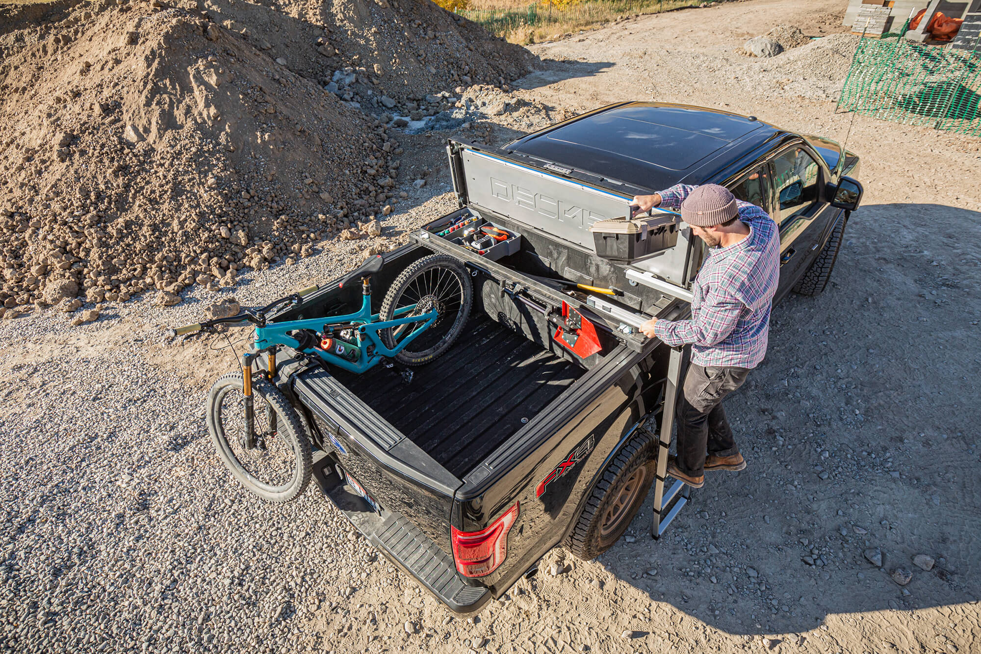 Truck tent with clearance toolbox