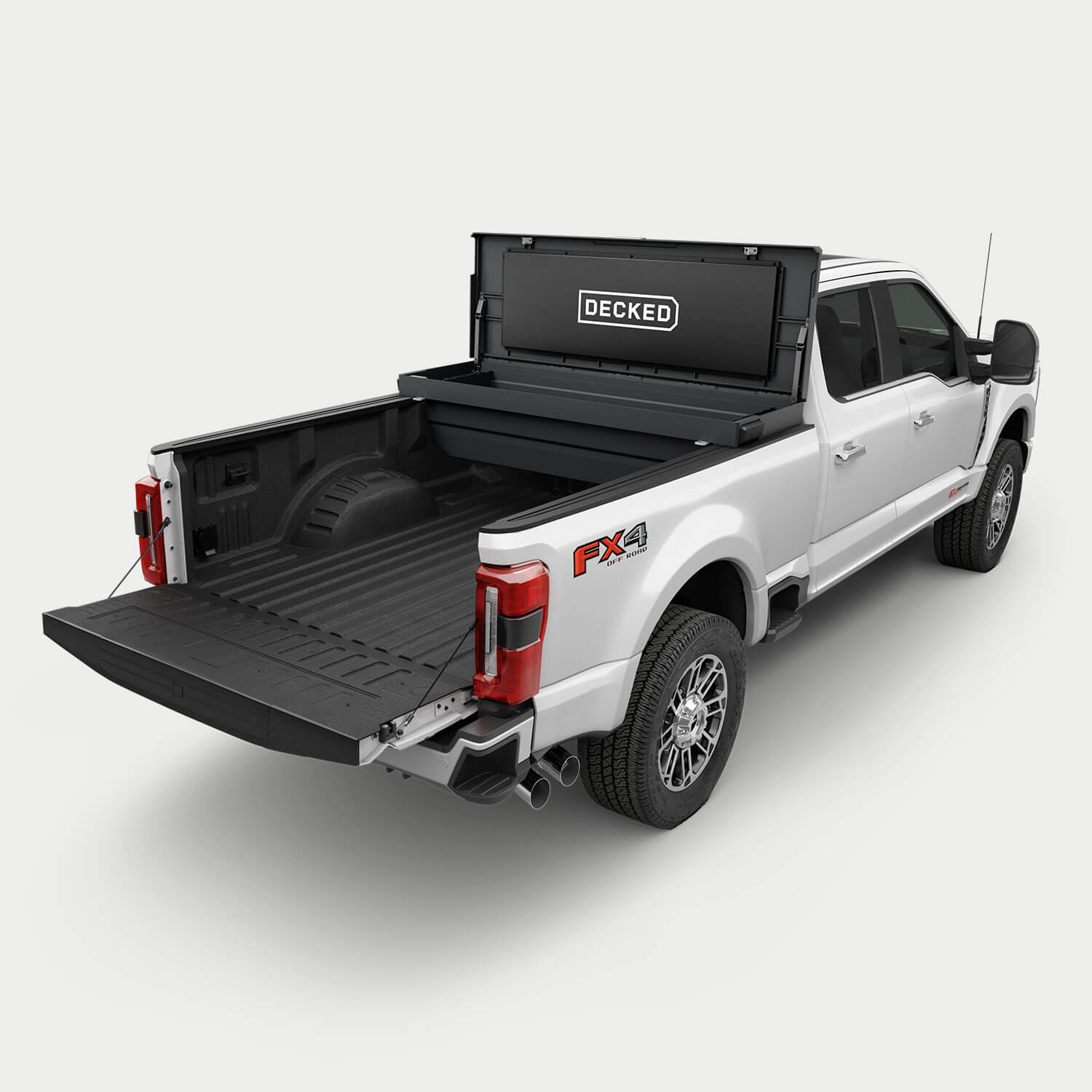 White pickup truck with a black DECKED Tool Box open in the bed.