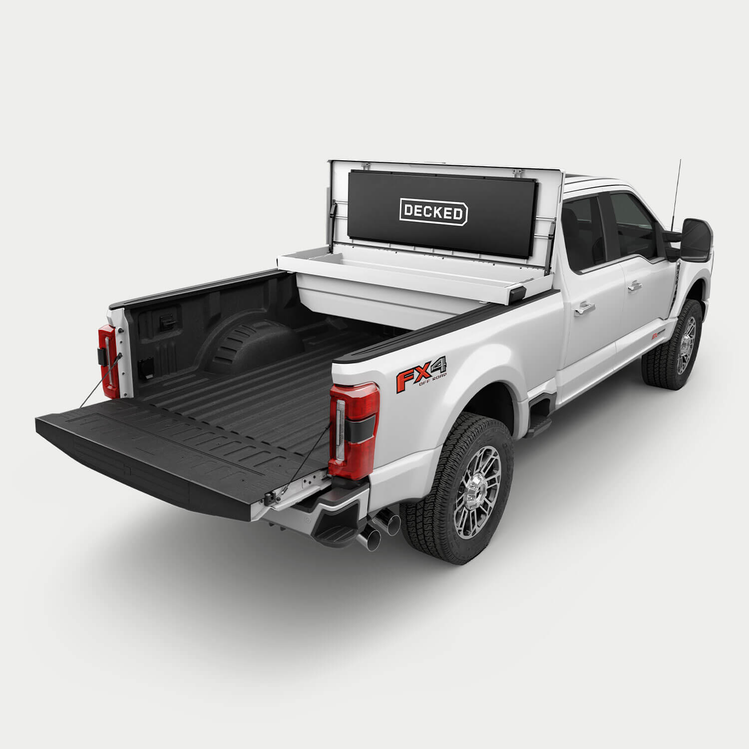White pickup truck with an white DECKED Tool Box open in the bed.